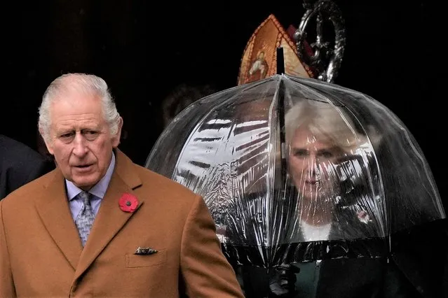 Britain's King Charles III and Camilla, the Queen Consort, walk out of York Minster as they go to unveil a statue of the late Queen Elizabeth II in York, England, Wednesday, November 9, 2022. (Photo by Alastair Grant/AP Photo)