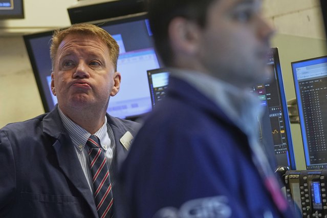 John Bowers works on the floor at the New York Stock Exchange in New York, April 9, 2025. (Photo by Seth Wenig/AP Photo)