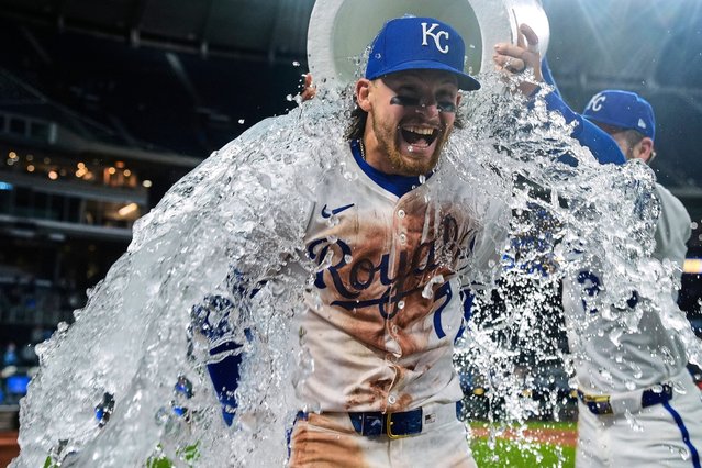 Kansas City Royals' Bobby Witt Jr. is doused by teammates after a baseball game against the Minnesota Twins, Tuesday, April 8, 2025, in Kansas City, Mo. (Photo by Charlie Riedel/AP Photo)