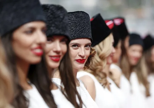 Grid girls line up for the drivers' parade before the Russian F1 Grand Prix in Sochi, Russia, October 11, 2015. (Photo by Grigory Dukor/Reuters)