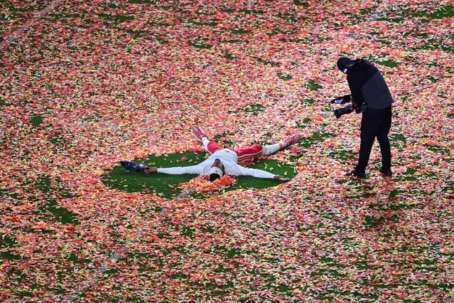 A Kansas City Chiefs' player celebrates winning Super Bowl LVII between the Kansas City Chiefs and the Philadelphia Eagles at State Farm Stadium in Glendale, Arizona, on February 12, 2023. (Photo by Angela Weiss/AFP Photo)