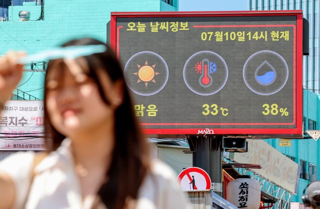 On the afternoon of the July 10, 2025, when the daytime temperature in Seoul reached 37 degrees Celsius, the temperature for that day was displayed on an electronic board installed on Hongdae Street in Mapo-gu, Seoul. (Photo by Park Seong-won)