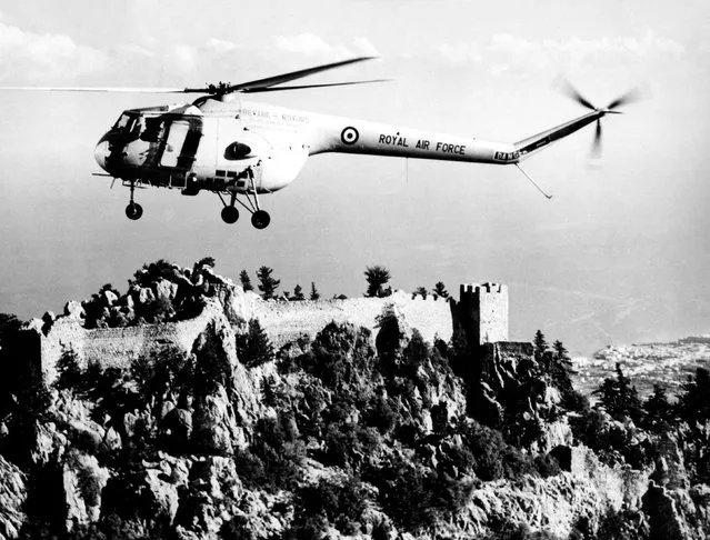 A Sycamore helicopter of 103 Squadron based at Nicosia, Cyprus, flying over St Hilarian Castle near Kyrenia, on the north of the island, 1961. (Photo by Air Historical Branch/RAF/PA Wire)