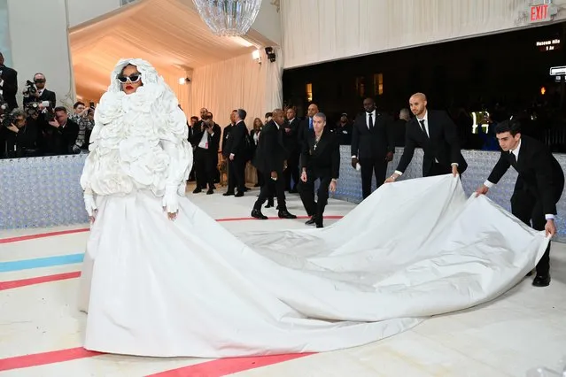 Barbadian singer/actress Rihanna arrives for the 2023 Met Gala at the Metropolitan Museum of Art on May 1, 2023, in New York. The Gala raises money for the Metropolitan Museum of Art's Costume Institute. The Gala's 2023 theme is “Karl Lagerfeld: A Line of Beauty”. (Photo by Angela Weiss/AFP Photo)