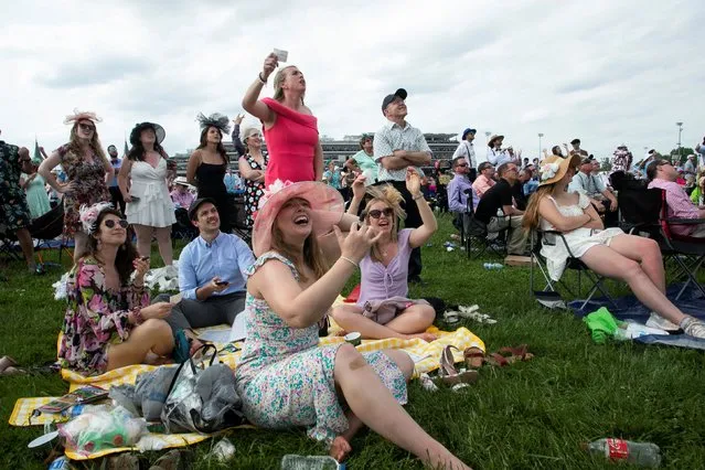 Fans react as a race starts on the day of the 149th Kentucky Derby at Churchill Downs  Louisville, Kentucky, U.S., May 6, 2023. (Photo by Amira Karaoud/Reuters)