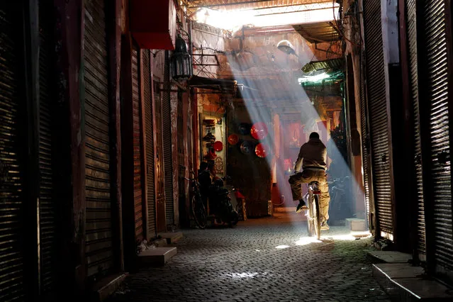 “Marrakech Traveler”. It was mid-morning and he must have wanted to ride into the light. I was shooting for the ABC TV show Born to Explore when I snapped this photo. Location: Marrakech, Morocco. (Photo and caption by John Barnhardt/National Geographic Traveler Photo Contest)