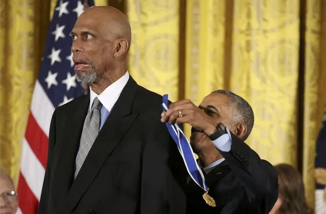 U.S. President Barack Obama awards the Presidential Medal of Freedom to NBA star Kareem Abdul-Jabbar (L) in the East Room of the White House in Washington, U.S., November 22, 2016. (Photo by Carlos Barria/Reuters)