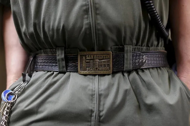 A guard displays his San Quentin State Prison belt buckle during a media tour of California's Death Row at San Quentin State Prison in San Quentin, California December 29, 2015. (Photo by Stephen Lam/Reuters)