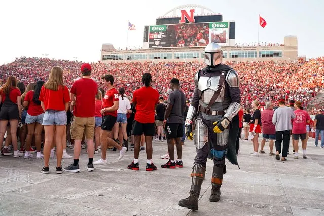 A fan dressed as the Mandalorian walks through the crowd before Wednesday’s match between Nebraska Cornhuskers and the Omaha Mavericks at Memorial Stadium on August 30, 2023 in Lincoln, Nebraska. (Photo by Dylan Widger/USA Today Sports)