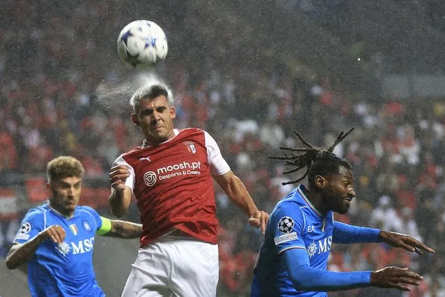 Braga's Victor Gomez, center, clears the ball in front Napoli's Andre-Frank Zambo Anguissa, right, during the Champions League group C soccer match between SC Braga and SCC Napoli at the Municipal stadium in Braga, Portugal, Wednesday, September 20, 2023. (Photo by Luis Vieira/AP Photo)