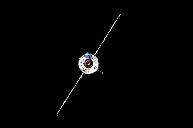 In this photo taken by Russian cosmonaut Oleg Novitsky and provided by Roscosmos Space Agency Press Service, the “Nauka” module is seen prior to docking with the International Space Station on Thursday, July 29, 2021. The newly arrived Russian science lab briefly knocked the International Space Station out of position Thursday when it accidentally fired its thrusters. For 47 minutes, the space station lost control of its orientation when the firing occurred a few hours after docking, pushing the orbiting complex from its normal configuration. The station's position is key for getting power from solar panels and or communications. Communications with ground controllers also blipped out twice for a few minutes. (Photo by Oleg Novitskiy/Roscosmos Space Agency Press Service photo via AP Photo)