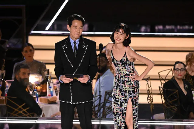 Squid Game South Korean actor Lee Jung-jae (L) and South Korean actress Jung Ho-yeon present the award for Outstanding Variety Sketch Series onstage during the 74th Emmy Awards at the Microsoft Theater in Los Angeles, California, on September 12, 2022. (Photo by Patrick T. Fallon/AFP Photo)