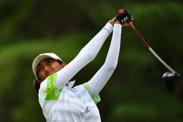 India's Aditi Ashok watches her drive from the 5th tee in round 4 of the womens golf individual stroke play during the Tokyo 2020 Olympic Games at the Kasumigaseki Country Club in Kawagoe on August 7, 2021. (Photo by Kazuhiro Nogi/AFP Photo)