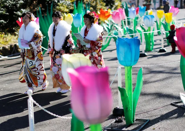 Japanese women wearing kimonos attend their Coming of Age Day celebration ceremony at Toshimaen amusement park in Tokyo, Japan on January 14, 2019. (Photo by Issei Kato/Reuters)