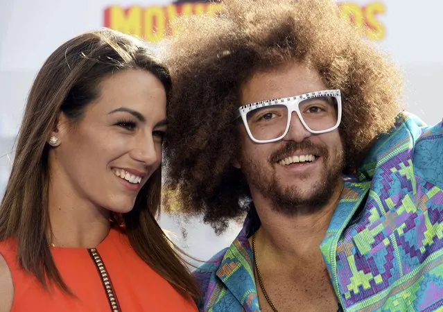 Redfoo and a guest arrive at the 2015 MTV Movie Awards in Los Angeles, California April 12, 2015. (Photo by Phil McCarten/Reuters)