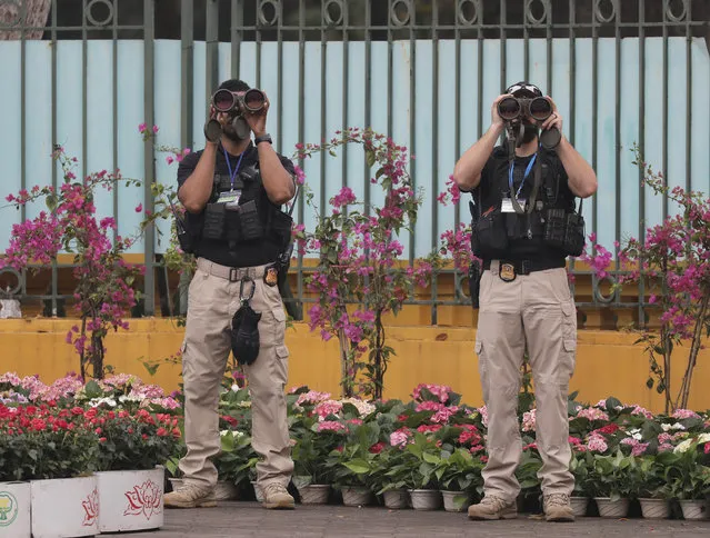 U.S. security scan outside the Presidential Palace where U.S. President Donald Trump will visit Wednesday, February 27, 2019, in Hanoi, Vietnam. The second summit between Trump and North Korean leader Kim Jong Un will take place in Hanoi on Feb. 27 and 28. (Photo by Vincent Yu/AP Photo)