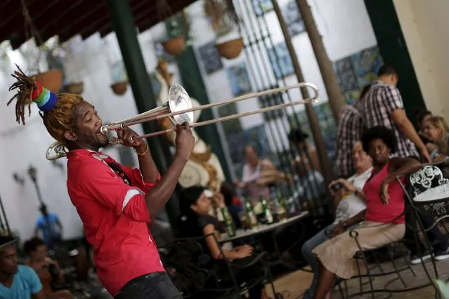 A musician performs in a restaurant in Havana March 16, 2016. (Photo by Ueslei Marcelino/Reuters)