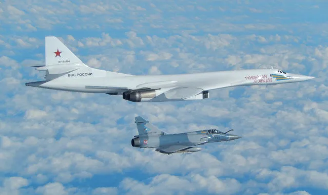 A Russian Blackjack bomber Tu-160 is intercepted and escorted by a French Mirage military fighter above French coast in this image taken and distributed by the French Air Force on February 9, 2017. (Photo by Reuters/Sirpa Air/French Air Force)