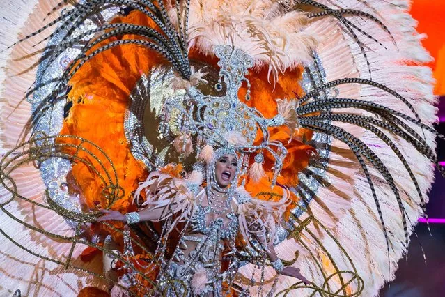 Gema Ceballos Vega, wearing a creation called “The Light”, performs on stage during Las Palmas' Carnival Queen ceremony in Las Palmas, Spanish Canary Island of Gran Canaria, February 24, 2017. (Photo by Borja Suarez/Reuters)