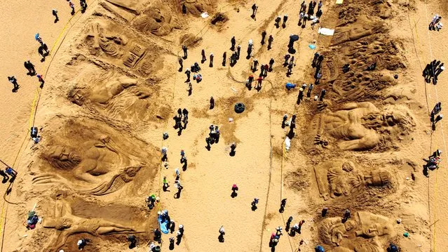 A drone view shows sand sculptures depicting biblical passages during Holy Week celebrations in the Arenal de Cochiraya, on the outskirts of Oruro, Bolivia on March 29, 2024. (Photo by Claudia Morales/Reuters)