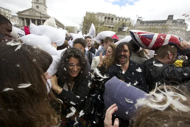 A mass pillow fight in Trafalgar Square in central London on April 5, 2014 on International Pillow Fight Day. (Photo by Jane Scanlan)