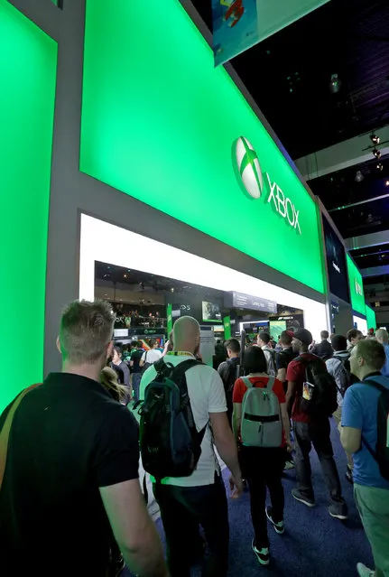 E3 2015 attendees enter the Xbox booth at E3 in Los Angeles on Tuesday, June 16, 2015. (Photo by Casey Rodgers/Invision for Microsoft/AP Images)