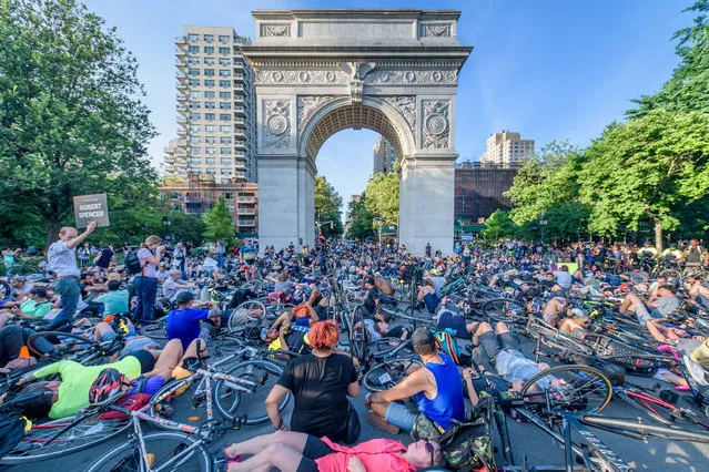 Hundreds of New York cyclists joined the NYC Bike Family, a coalition of over 15 bicycle advocacy groups at a mass die-in in Washington Square Park, a non-violent, peaceful memorial event to protest about the number of people killed on the roads while on bikes on July 9, 2019. (Photo by Erik McGregor/Zuma Press/Rex Features/Shutterstock)