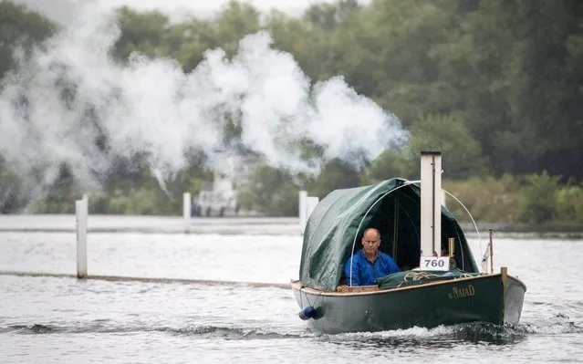 The steamboat Naiad makes her way along the river Thames during day one of the Thames Traditional Boat Festival in Henley-on-Thames, England on July 19, 2019. (Photo by Andrew Matthews/PA Images via Getty Images)