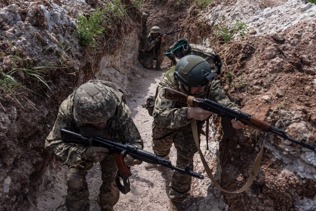 Ukrainian soldiers conduct assault training at an undetermined location in Donetsk Oblast, Ukraine on May 18, 2024. (Photo by Diego Herrera Carcedo/Anadolu via Getty Images)