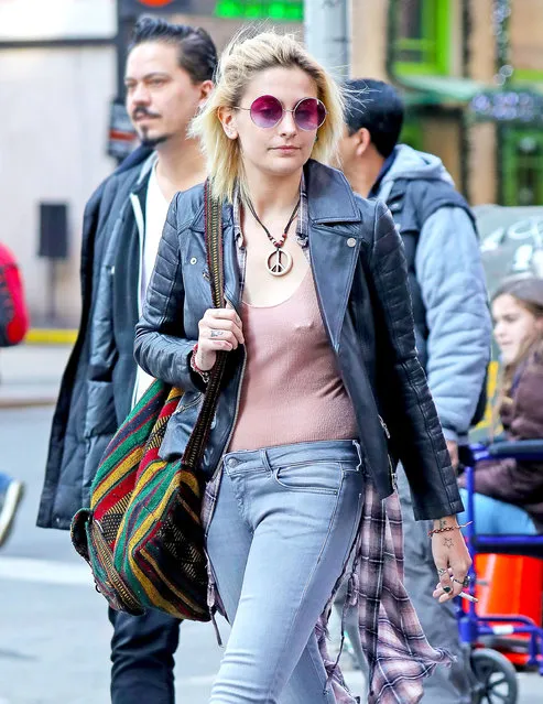 Actress and model Paris Jackson spotted displaying her nipple piercing through her shirt, as she strolled around in Midtown with friends in New York City, New York on March 22, 2017. Paris was also spotted smoking while walking around after lunch. (Photo by Felipe Ramales/Splash News)