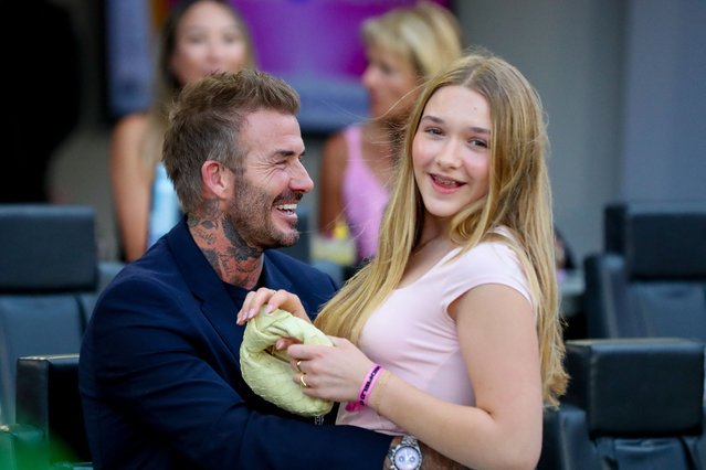 Inter Miami's co-owner David Beckham shares moment with his daughter Harper during the Major League Soccer (MLS) regular season football match between Inter Miami CF and St. Louis CITY SC at Chase Stadium in Fort Lauderdale, Florida in June 1, 2024. (Photo by Chris Arjoon/AFP Photo)