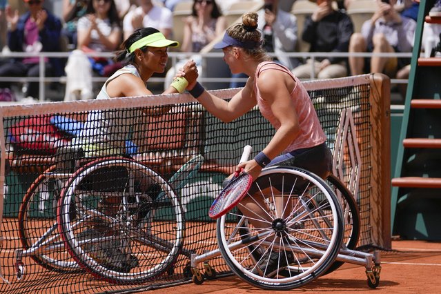Netherlands' Diede de Groot, right, is congratulated by China's Zhang Zhizhen after winning the women's wheelchair final match of the French Open tennis tournament at the Roland Garros stadium in Paris, France, Saturday, June 8, 2024. (Photo by Thibault Camus/AP Photo)
