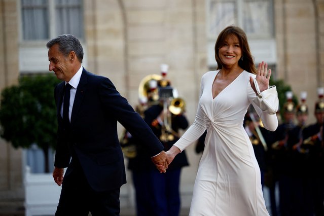 Former French President Nicolas Sarkozy and his wife Carla Bruni arrive to attend a state dinner in honor of U.S. President Joe Biden and first lady Jill Biden at the Elysee Palace in Paris, France on June 8, 2024. (Photo by Sarah Meyssonnier/Reuters)