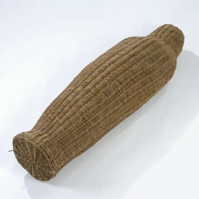 A coffin made of wicker in the shape of a human. (Photo by Caters News Agency)