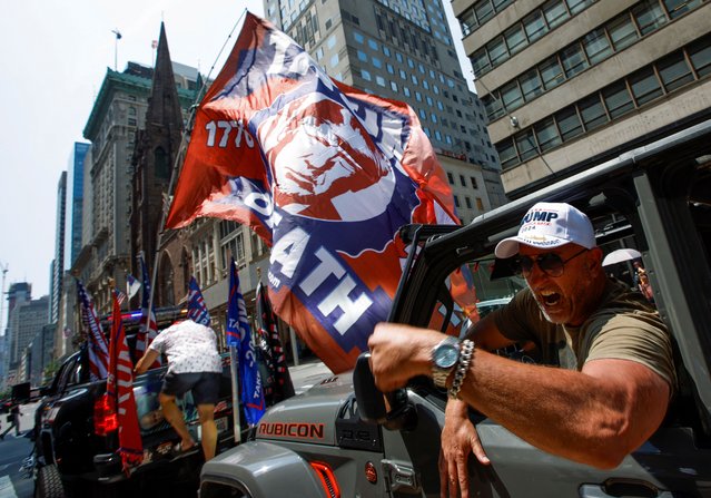 A supporter of Republican presidential candidate and former President Donald Trump reacts, after Trump was injured when shots were fired during a campaign rally held in Butler, Pennsylvania, outside Trump Tower in New York on July 14, 2024. (Photo by Eduardo Munoz/Reuters)