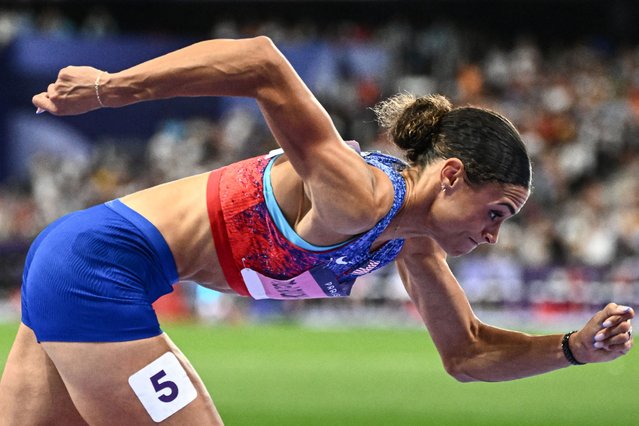 US' Sydney Mclaughlin-Levrone takes the start in the women's 400m hurdles final of the athletics event at the Paris 2024 Olympic Games at Stade de France in Saint-Denis, north of Paris, on August 8, 2024. (Photo by Jewel Samad/AFP Photo)