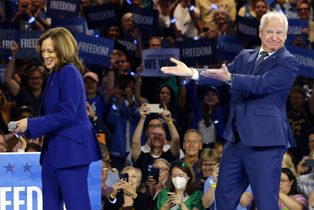 Democratic presidential nominee Vice President Kamala Harris and running mate Minnesota Gov. Tim Walz appear at the Fiserv Forum during a campaign rally in Milwaukee, Tuesday, August 20, 2024. (Photo by Jeffrey Phelps/AP Photo)