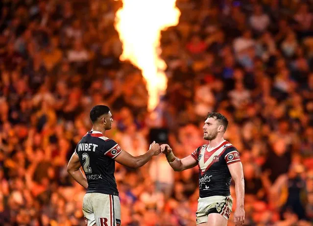 Daniel Tupou and Angus Crichton of the Roosters celebrate their victory at the final siren during the round 10 NRL match between the Sydney Roosters and the Parramatta Eels at Suncorp Stadium, on May 15, 2022, in Brisbane, Australia. (Photo by Albert Perez/Getty Images)