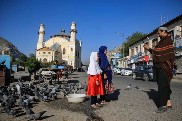 Afghans celebrate Eid al-Fitr in Kabul, Afghanistan, 01 May 2022. Muslims around the world celebrate Eid al-Fitr, the three day festival marking the end of Ramadan. Eid al-Fitr is one of the two major holidays in the Islamic calendar. (Photo by EPA/EFE/Stringer)