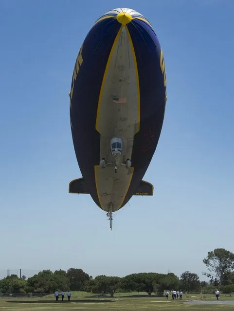 The Goodyear blimp “Spirit of America” takes off from Carson, California August 5, 2015. (Photo by Mike Blake/Reuters)