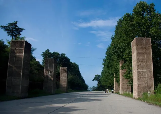 All along the highway near the south korean border, you can see those huge cement blocks. They can be used to block the highway in case of american invasion. (Photo by Eric Lafforgue/Exclusivepix Media)