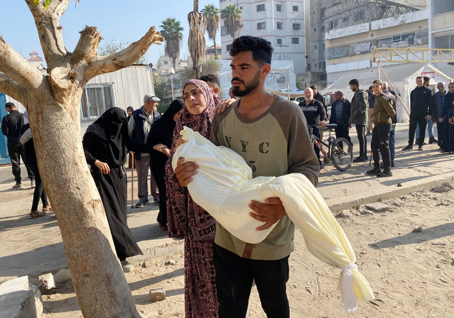 People mourns the bodies of Palestinain killed in Israeli attacks on Sheikh Ridwan neighborhood, in the Al-Ahli Baptist hospital for the funeral procedures in Gaza City, Gaza on November 15, 2024. (Photo by APAImages/Rex Features/Shutterstock)