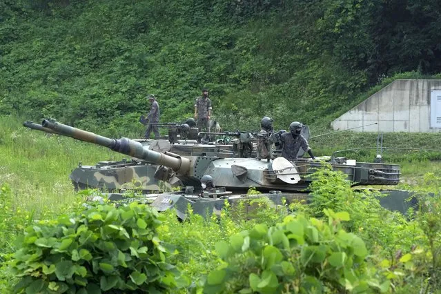 South Korean army soldiers prepare for an exercise at a training field in Paju, South Korea, near the border with North Korea, Wednesday, July 27, 2022. North Korean leader Kim Jong Un warned he's ready to use his nuclear weapons in potential military conflicts with the United States and South Korea, state media said, as he unleashed fiery rhetoric against rivals he says are pushing the Korean Peninsula to the brink of war. (Photo by Ahn Young-joon/AP Photo)