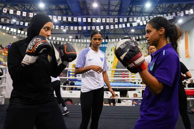 Somali professional boxer Ramla Ali (centre) at the Waad Academy, Jeddah, Saudi Arabia on Thursday, August 18, 2022, during a community event with local women who like to Box. (Photo by Nick Potts/PA Images via Getty Images)