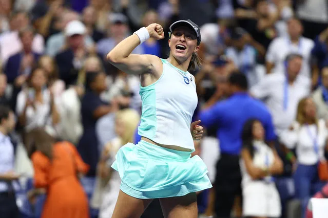 Iga Swiatek of Poland celebrates after defeating Aryna Sabalenka during their Women’s Singles Semifinal match on Day Eleven of the 2022 US Open at USTA Billie Jean King National Tennis Center on September 08, 2022 in the Flushing neighborhood of the Queens borough of New York City. (Photo by Elsa/Getty Images)