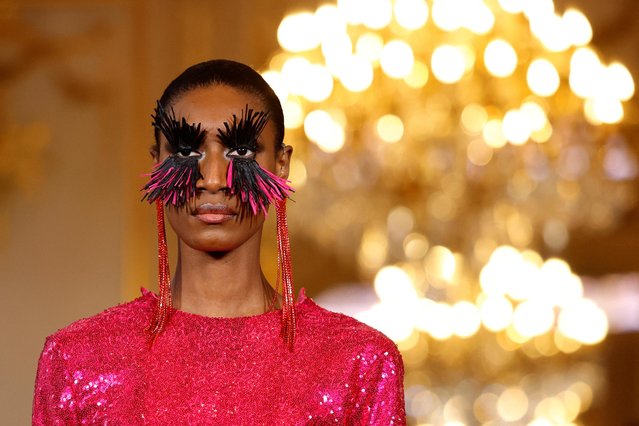 A model presents a creation by designer Imane Ayissi as part of his Haute Couture Spring/Summer 2023 collection show in Paris, France on January 26, 2023. (Photo by Sarah Meyssonnier/Reuters)