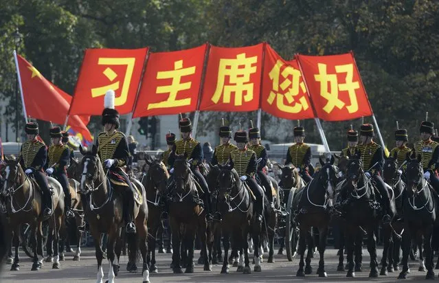 Members of the cavalry parade down the Mall during the visit of China's President Xi Jinping to London, Britain October 20, 2015. (Photo by Toby Melville/Reuters)