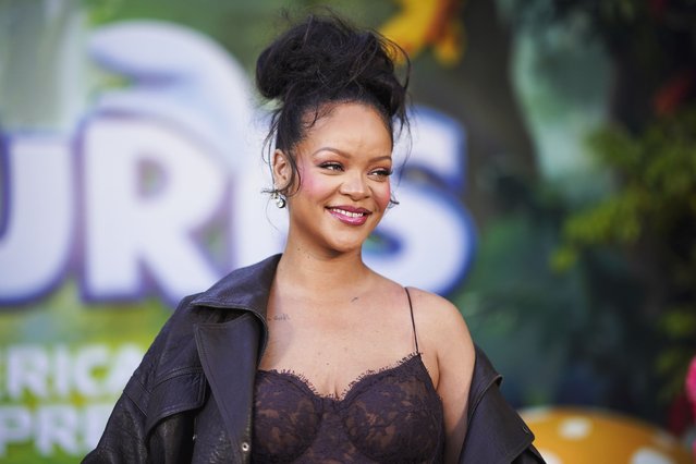Barbadian singer Rihanna arrives at the premiere of “Smurfs” on Sunday, July 13, 2025, at Paramount Studios in Los Angeles. (Photo by Jordan Strauss/Invision/AP Photo)