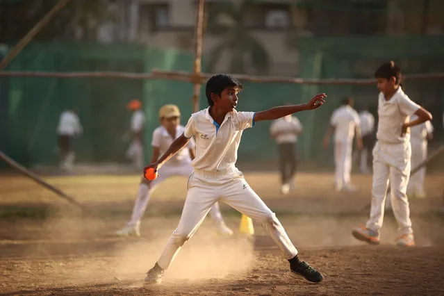 Young boys go through a training session at the PHCA Cricket Academy on February 13, 2023 in Nagpur, India. (Photo by Robert Cianflone/Getty Images)