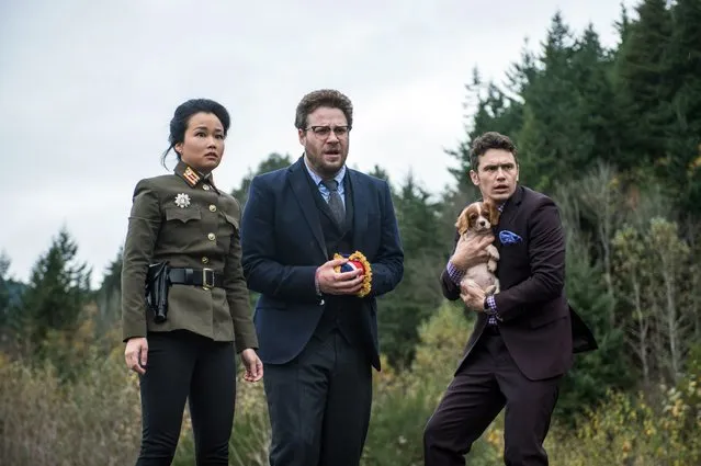 This photo provided by Columbia Pictures – Sony shows, from left, Diana Bang, as Sook, Seth Rogen, as Aaron, and James Franco, as Dave, in Columbia Pictures’ “The Interview”. When a group claiming credit for the hacking of Sony Pictures Entertainment threated violence against theaters showing “The Interview” earlier this week, Sony Pictures and several national theater chains surrendered to the hackers and North Korea by pulling the movie ahead of its planned Christmas release. (Photo by Ed Araquel/AP Photo/Columbia Pictures – Sony)